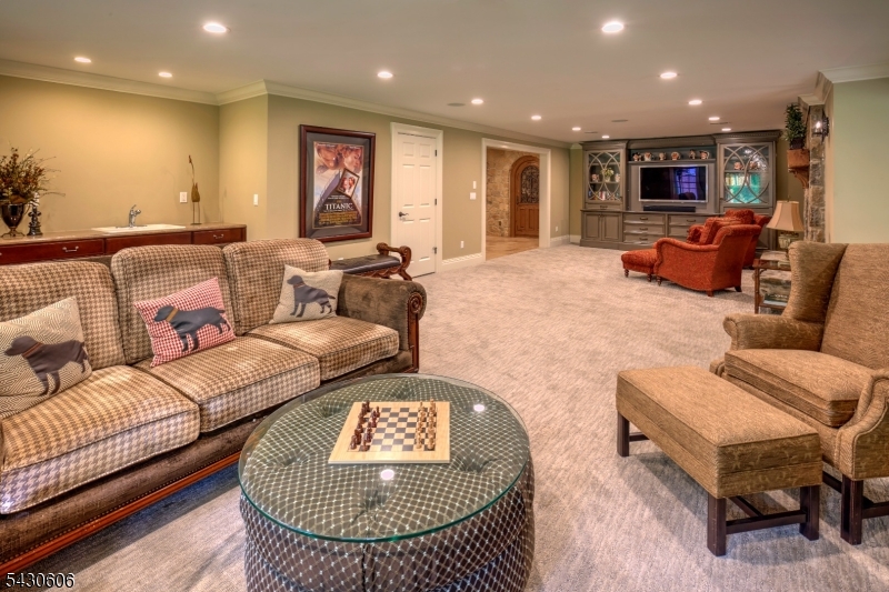 5 Burnett Road Mendham, NJ 07945 - Photo 39 of 50 a living room with furniture and kitchen view
