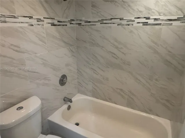 a view of a storage and utility room in a house