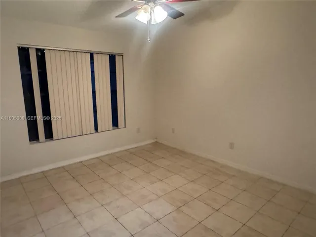 a front view of a house with yard