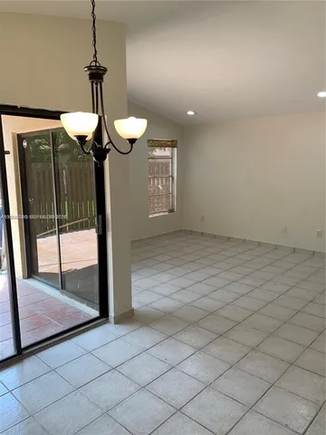 a bathroom with a sink vanity and a mirror