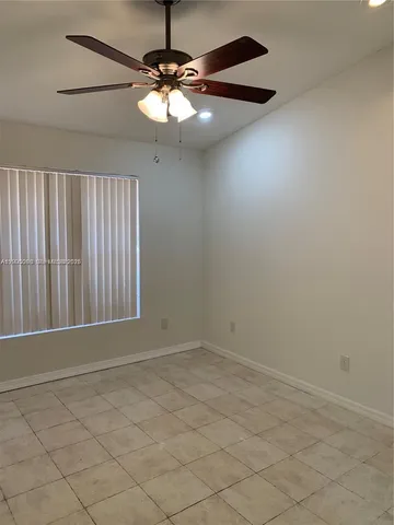 a bathroom with a sink a mirror and a shower