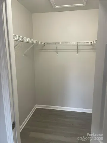 a view of a room with racks on the wall