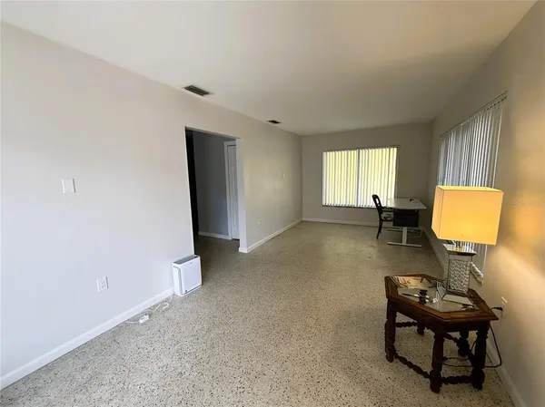 a view of a livingroom with furniture and a couch
