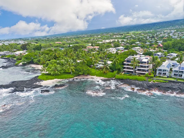a view of a lake with a yard