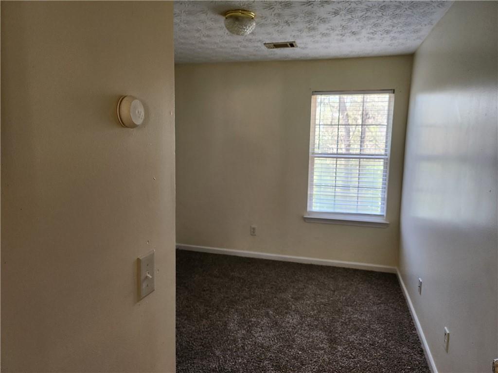 2935 Fields Drive Lithonia, GA 30038 - Photo 9 of 13 an entryway of a house with windows