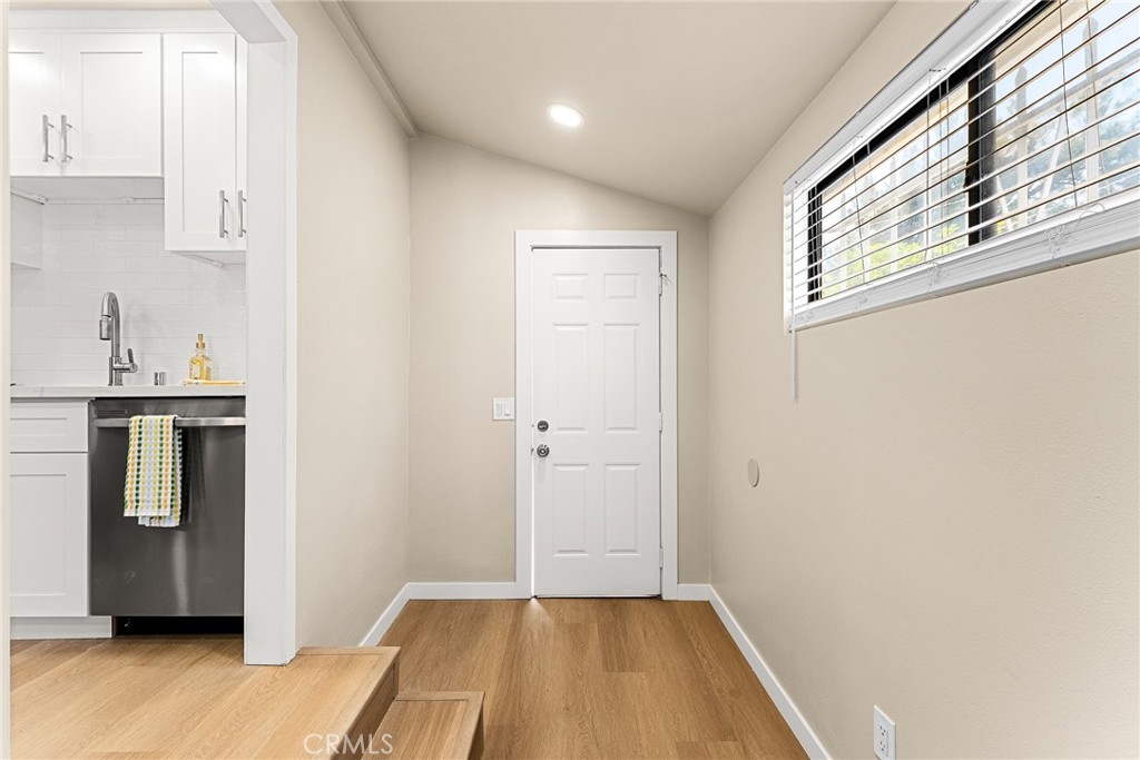 2857 Mulberry Street Riverside, CA 92501 - Photo 12 of 20 a view of a room with wooden floor and cabinet