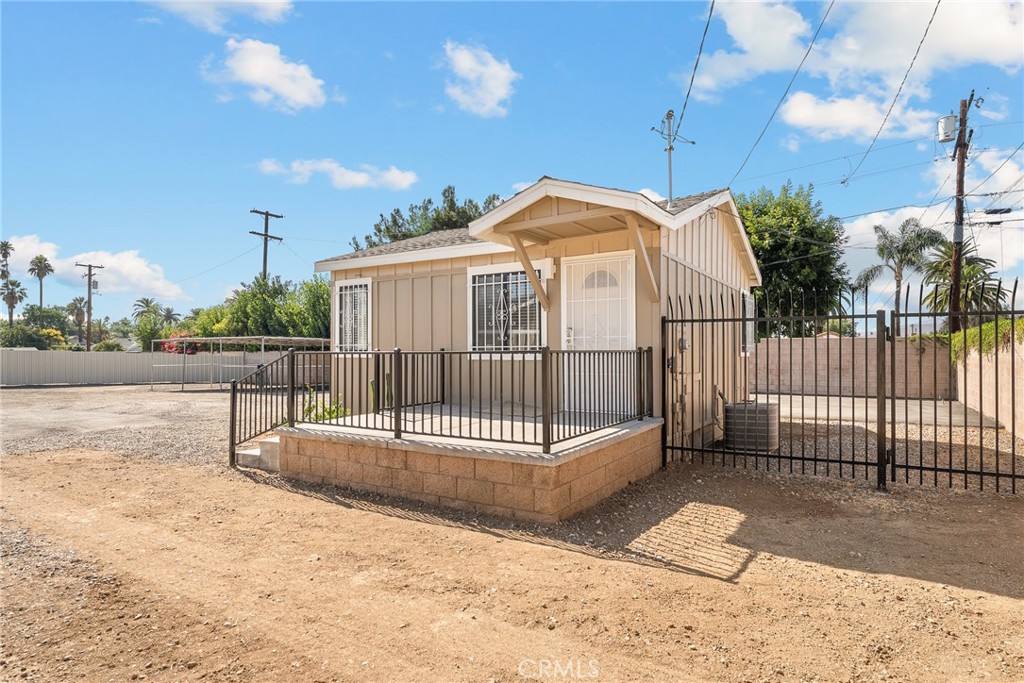2857 Mulberry Street Riverside, CA 92501 - Photo 14 of 20 a view of a house with a fence