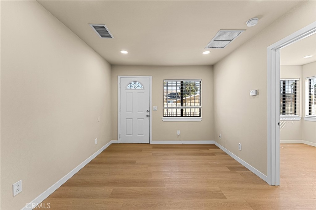 2857 Mulberry Street Riverside, CA 92501 - Photo 4 of 20 wooden floor in an empty room