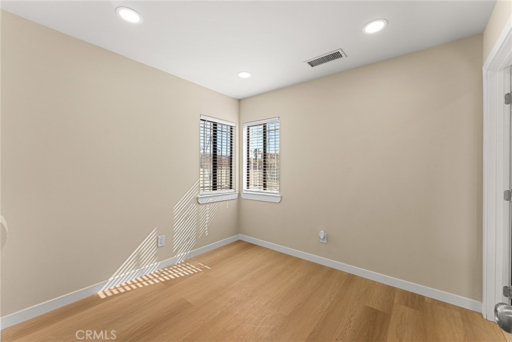 2857 Mulberry Street Riverside, CA 92501 - Photo 6 of 20 an empty room with windows