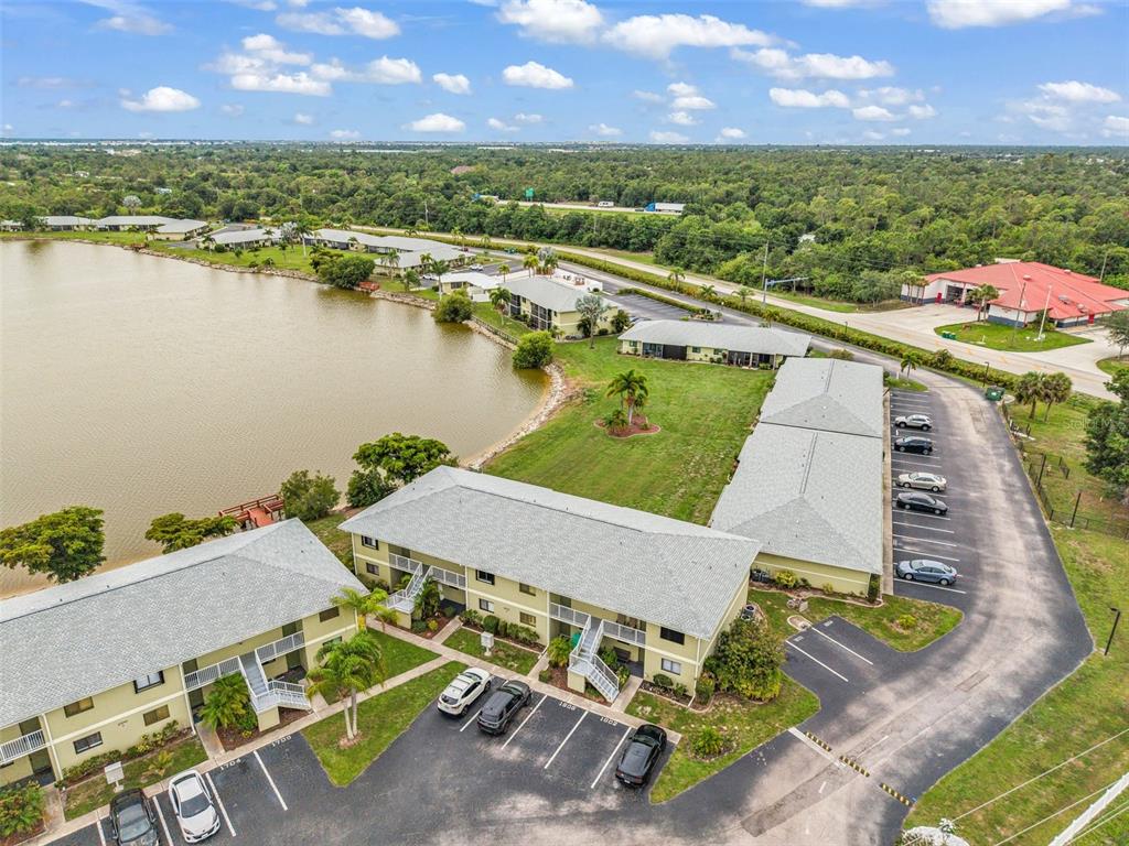 25225 Rampart Boulevard, Unit 1604 Punta Gorda, FL 33983 - Photo 34 of 41 an aerial view of a house with a ocean view