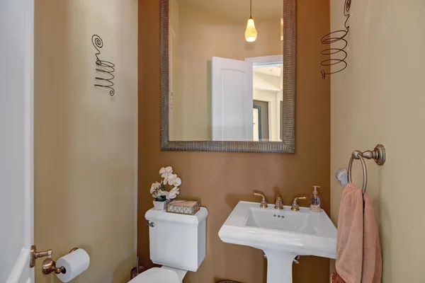 a bathroom with a sink a mirror and a shower