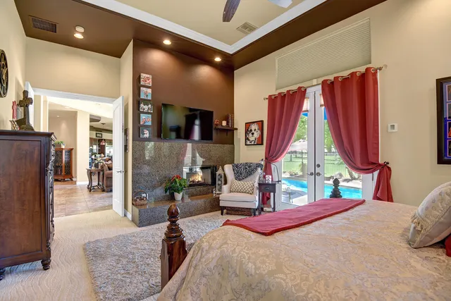 a view of a swimming pool with a patio