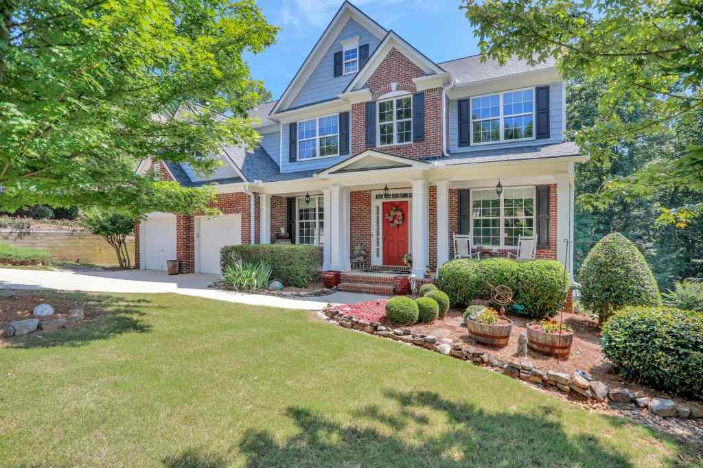 This gorgeous home has a yard that you will love coming home too!  The curb appeal is perfect!