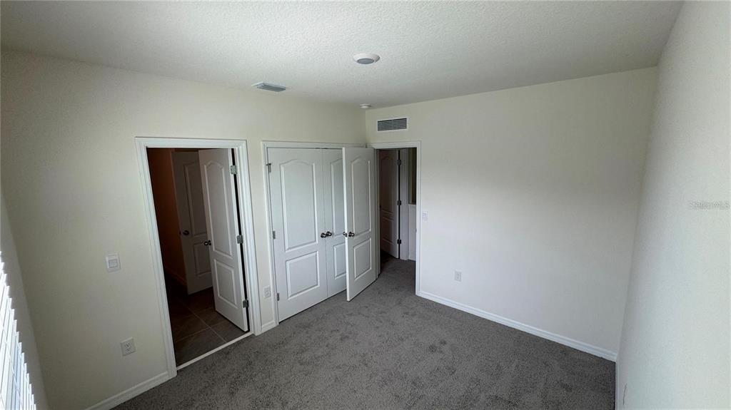 1446 Isleta Loop Kissimmee, FL 34741 - Photo 20 of 27 a view of hallway