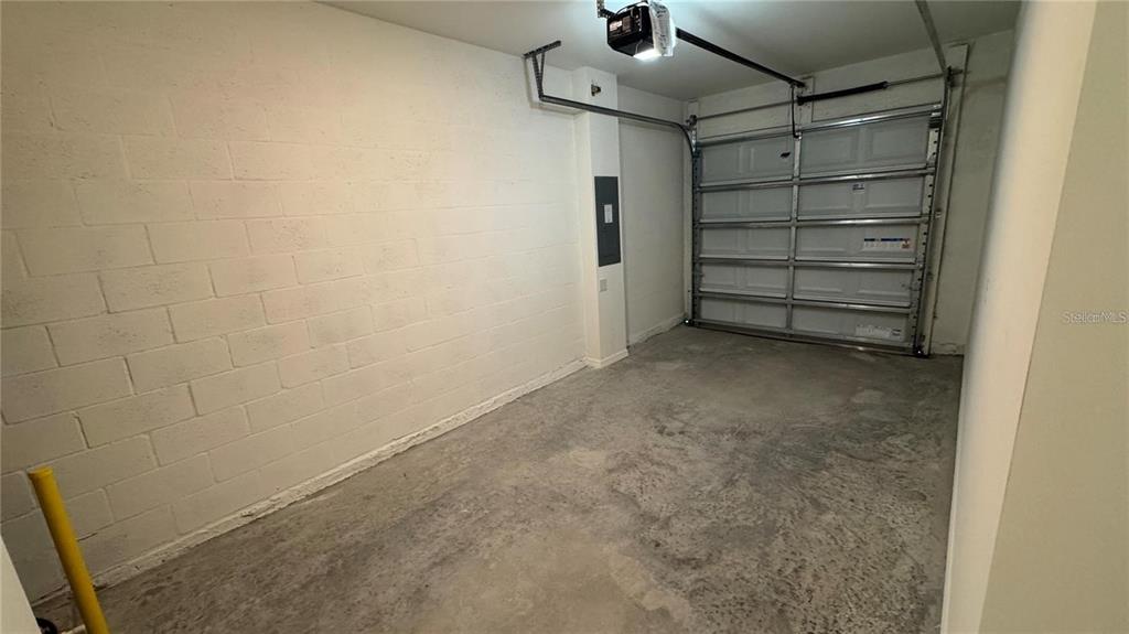 1446 Isleta Loop Kissimmee, FL 34741 - Photo 24 of 27 a view of walk in closet with empty racks