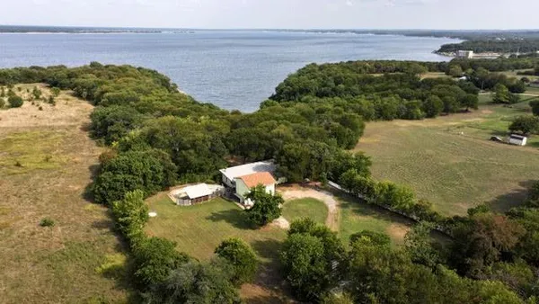 a view of a lake from a yard