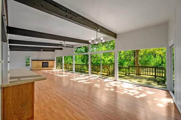 a view of a porch and garden