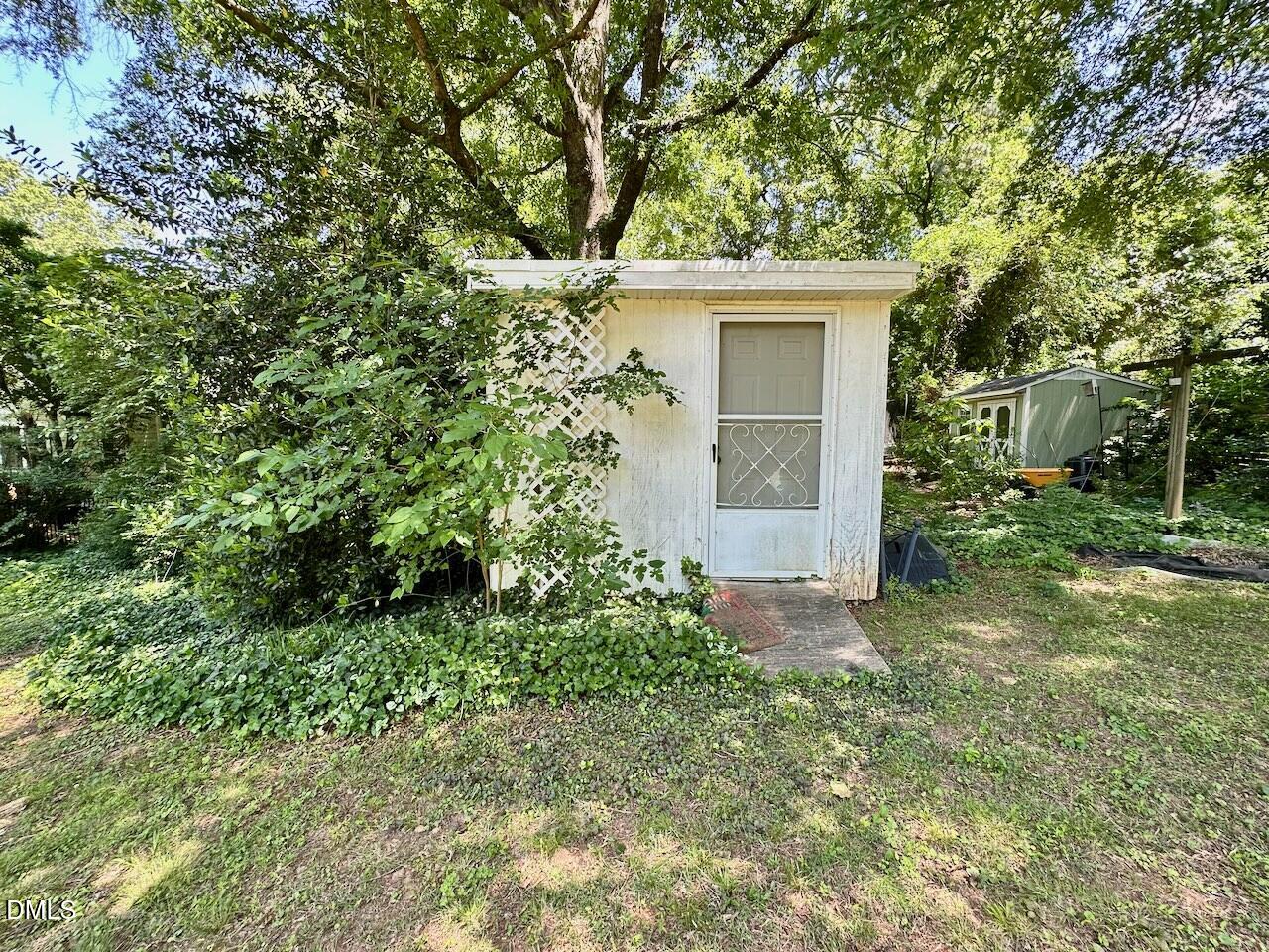 2813 Barmettler Street Raleigh, NC 27607 - Photo 21 of 22 front view of a house with a yard
