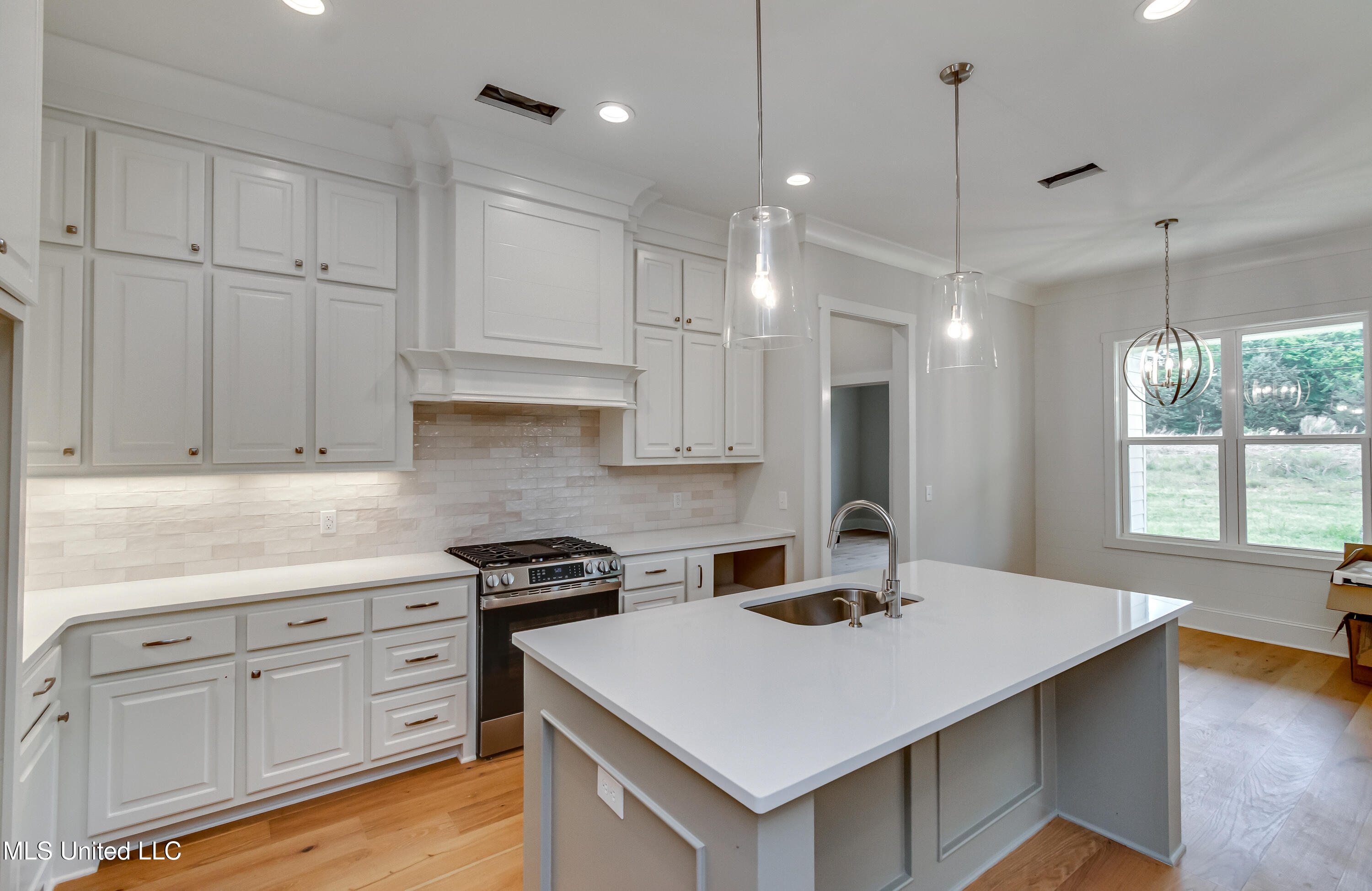 122 Grayson Way Madison, MS 39110 - Photo 17 of 50 Oversized Island with Bar Seating