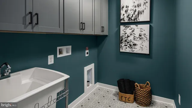 a bathroom with a sink and a window