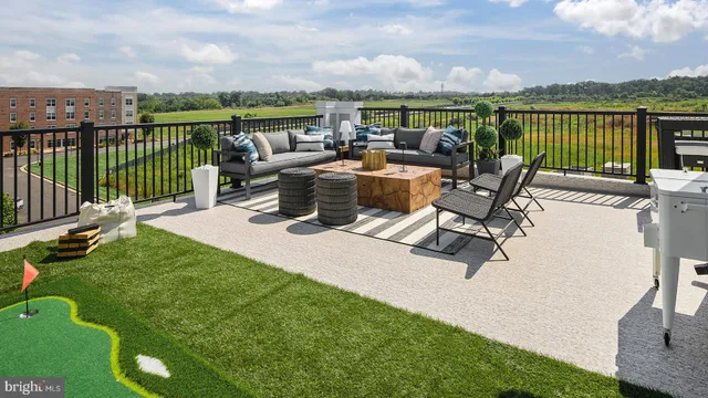 a view of a terrace with furniture