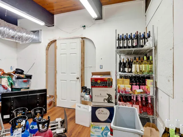 a view of a swimming pool with an outdoor space and seating area