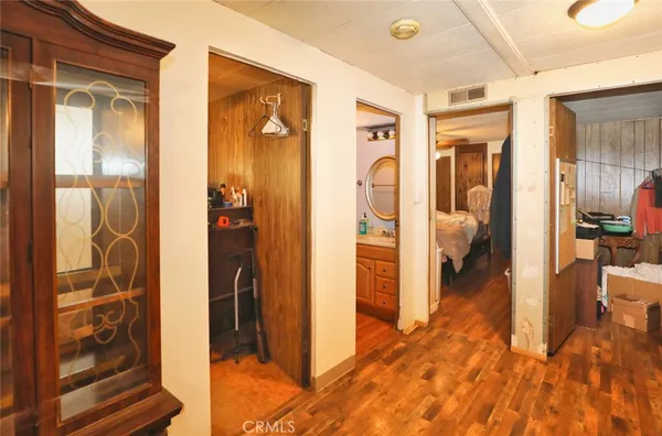 a en suite bathroom with a shower and a sink