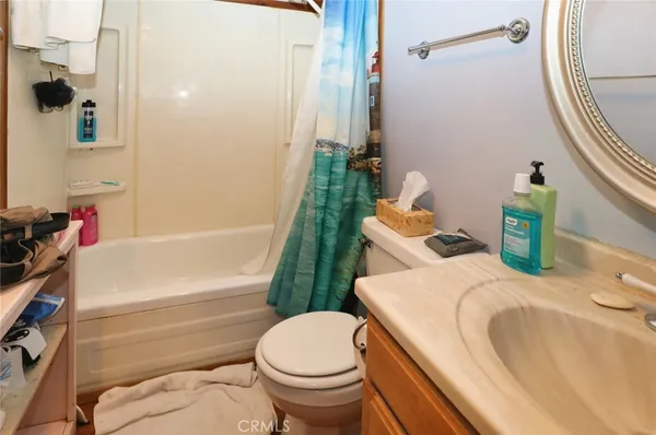 a bathroom with a sink and toilet