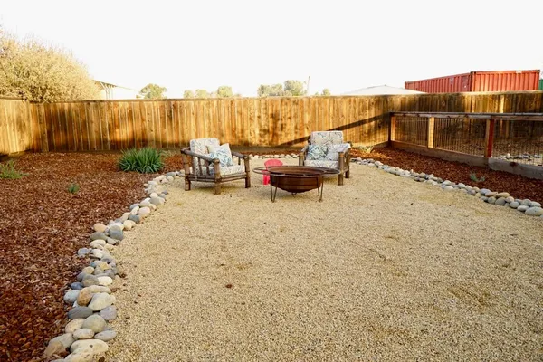 a view of a terrace with sitting area
