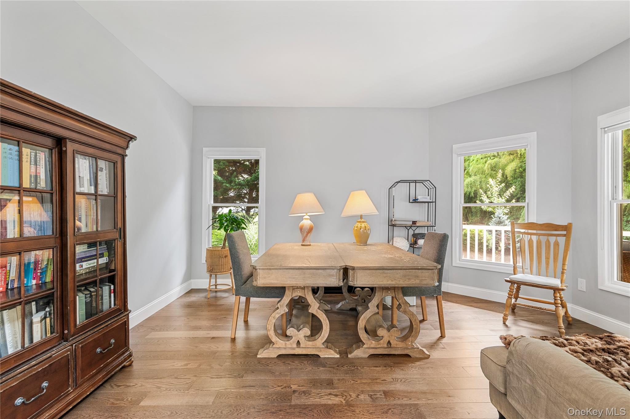 91 Bennetts Road East Setauket, NY 11733 - Photo 7 of 31 Dining space featuring wood finished floors and baseboards