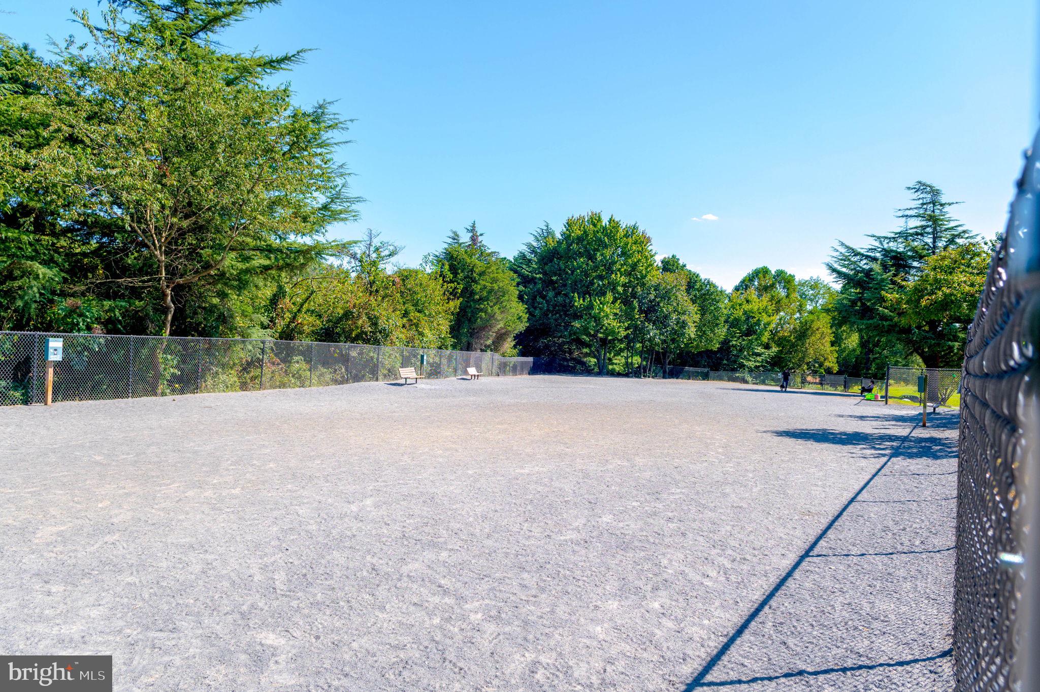 1443 Northgate Square, Unit 22B Reston, VA 20190 - Photo 33 of 42 a view of a road with a yard
