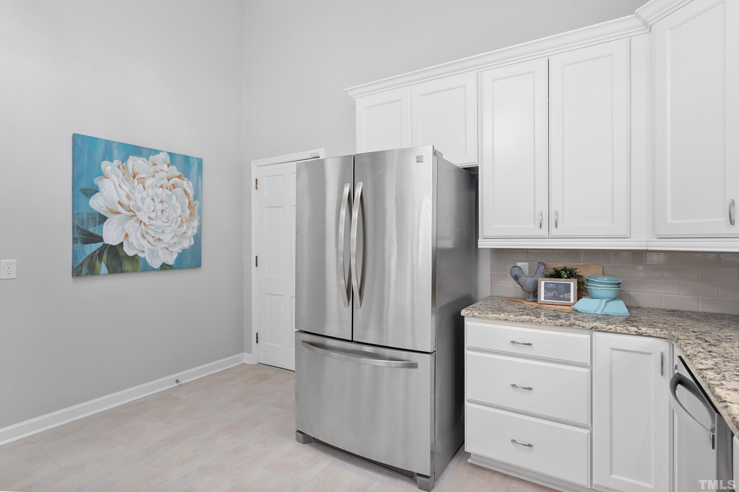 4316 Azalea Drive Raleigh, NC 27612 - Photo 54 of 54 a kitchen with appliances and cabinets