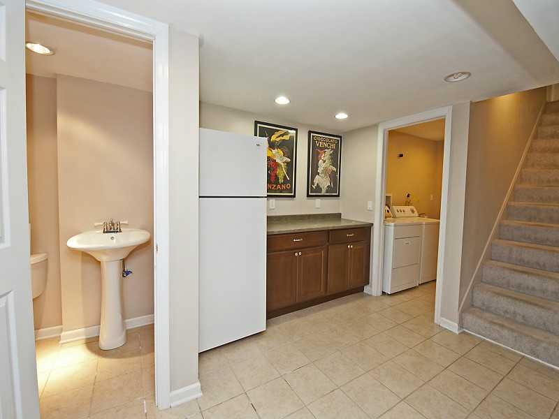 615 Trotwood Ridge Road Upper St. Clair, PA 15241 - Photo 19 of 19 Other. lower level foyer...view of powder room, good sized laundry off to the right.