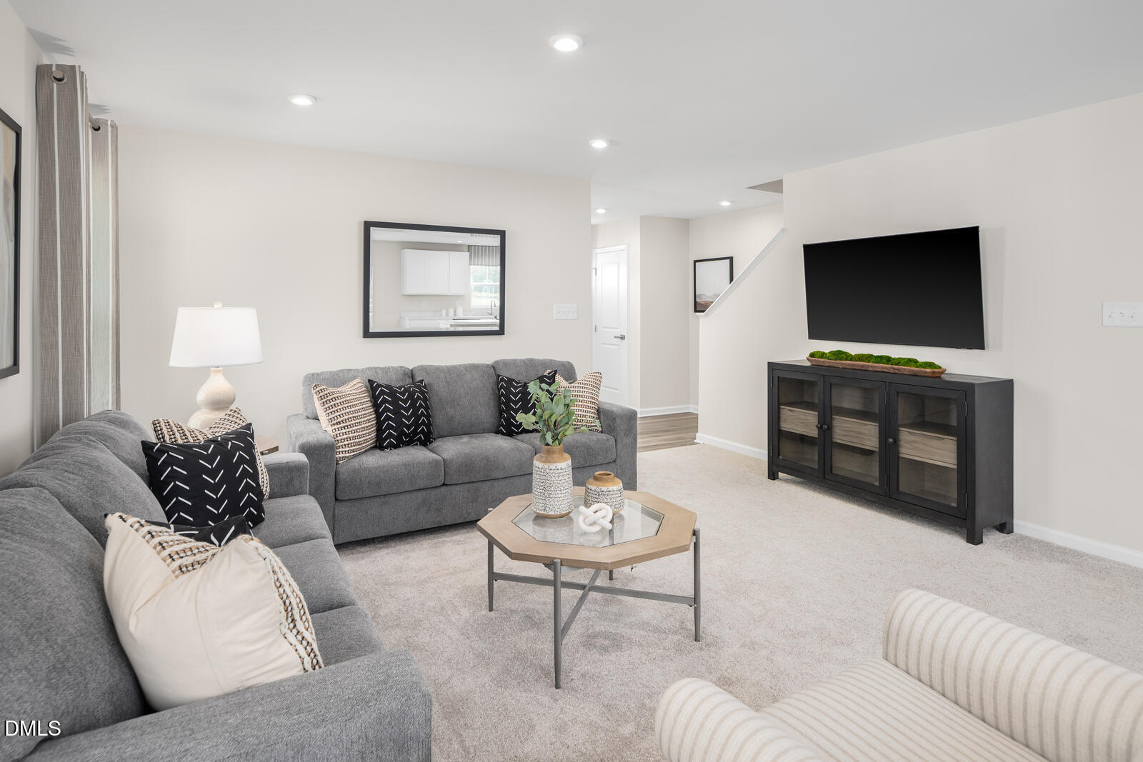 25 Better Day Way Lillington, NC 27546 - Photo 8 of 25 a living room with furniture and a flat screen tv