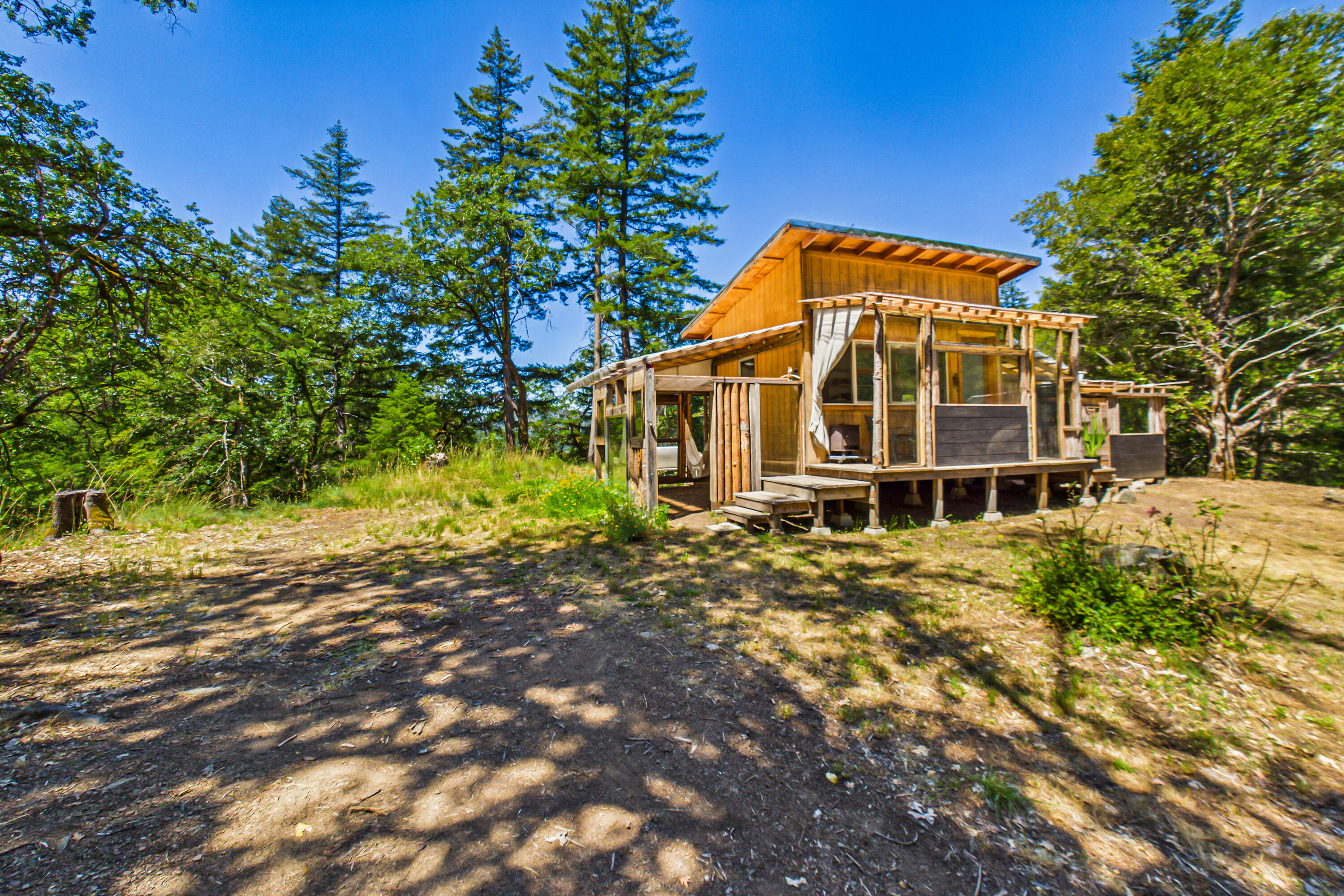 60890 Bell Springs Road Laytonville, CA 95454 - Photo 33 of 77 a view of a house with a yard
