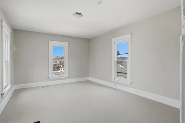 a view of an empty room with window