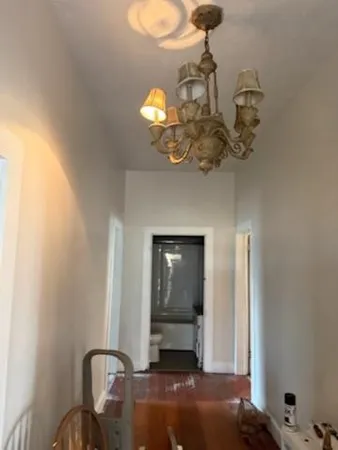 a view of livingroom and hardwood floor