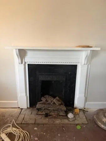 a living room with a fireplace