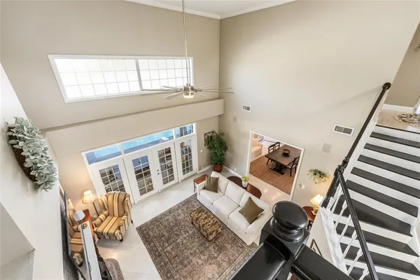 a living room with a bed and furniture