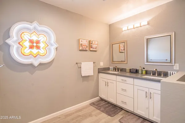 a bathroom with a shower and a shower
