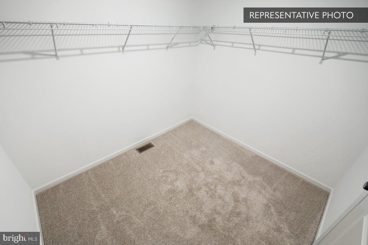 6309 Liam Drive Spring Grove, PA 17362 - Photo 13 of 20 a view of a room with racks on the wall