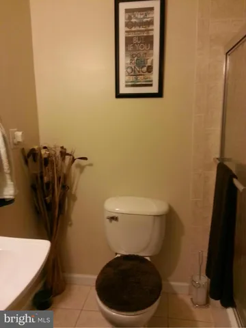 a kitchen with a sink a counter space and appliances