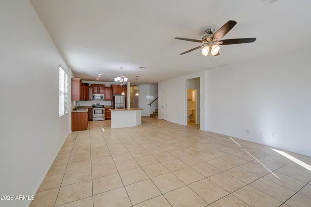a view of a kitchen with furniture and a kitchen