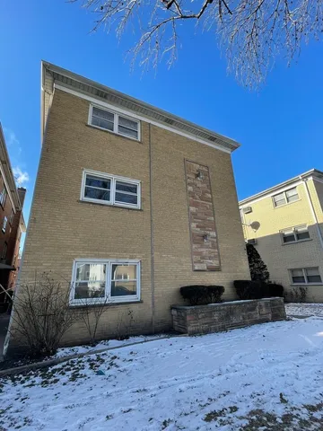 a view of wooden floor in an empty room