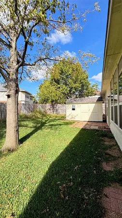 a view of a garden with an outdoor space