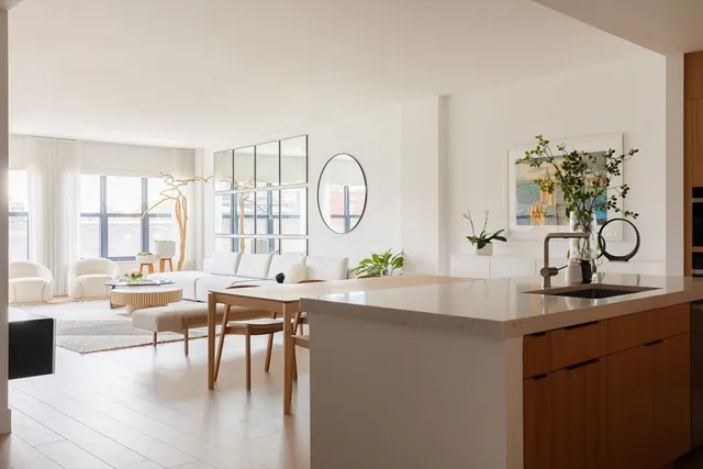 a very nice looking dining room with a table and chairs