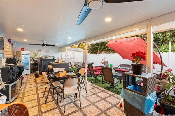 a outdoor space with lots of tables and chairs