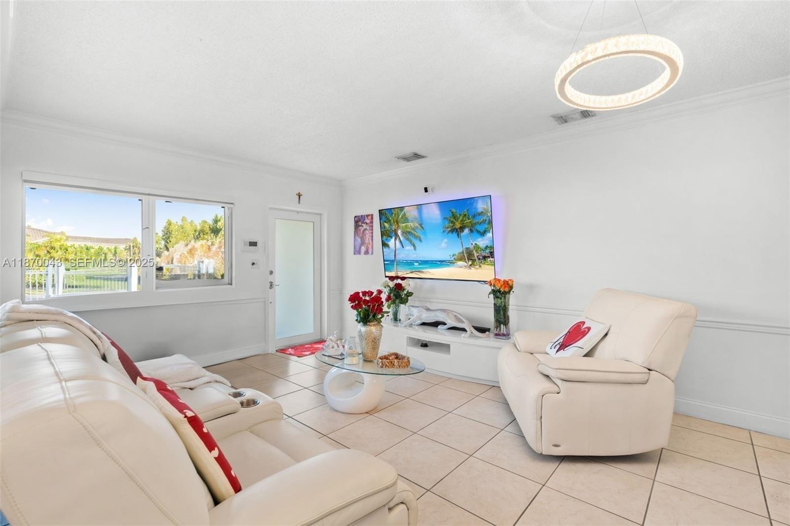 17874 Southwest 114th Avenue Miami, FL 33157 - Photo 3 of 18 a living room with furniture and a window