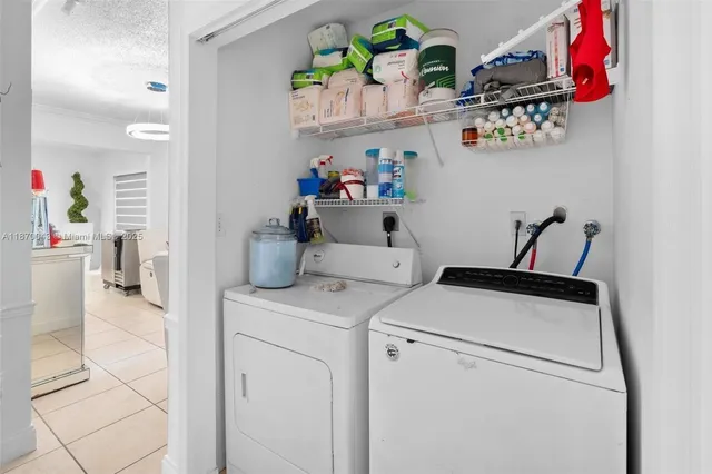 a storage room with washer and dryer