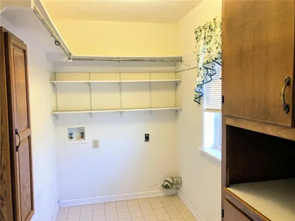 a view of storage and utility room